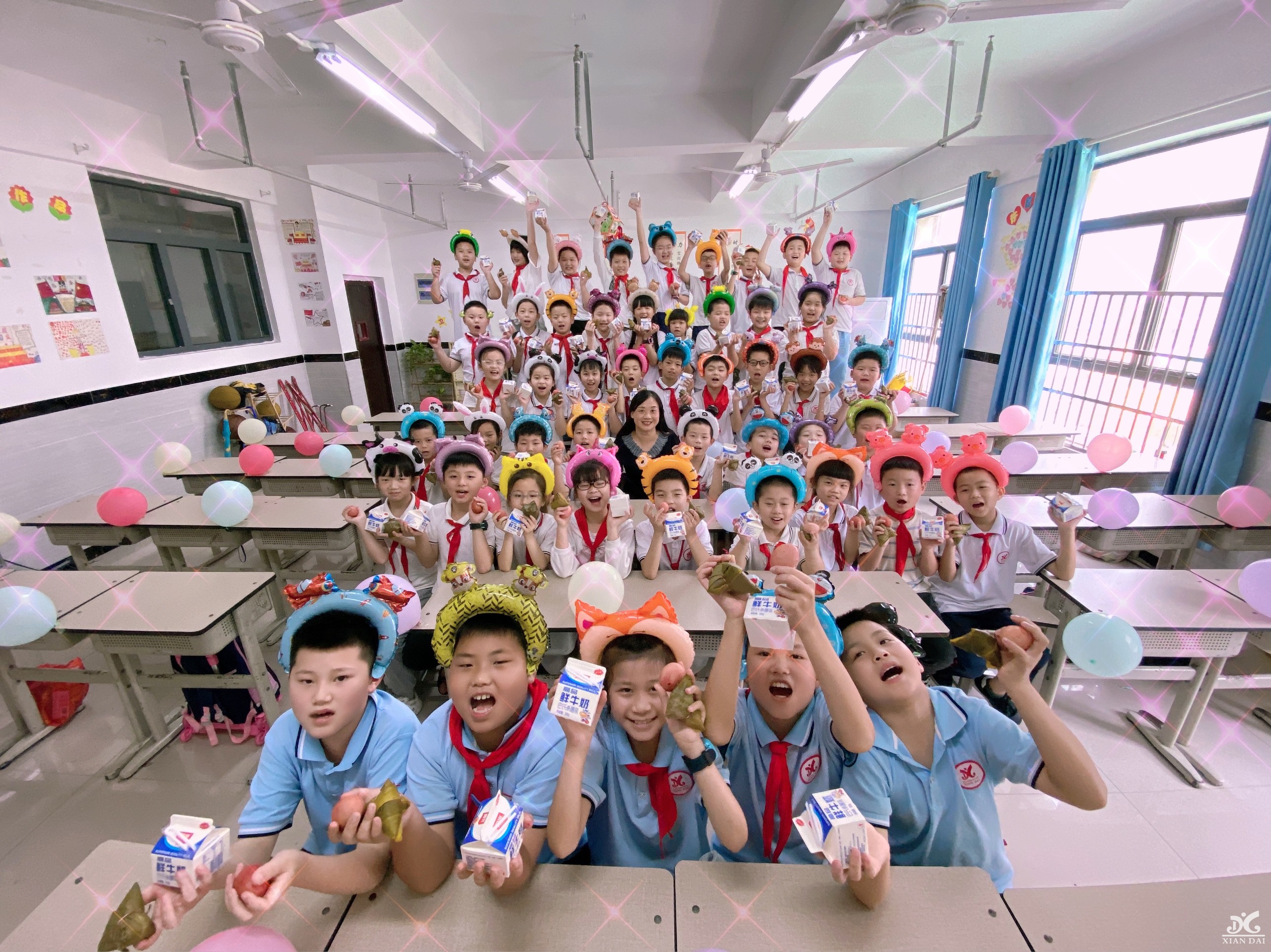 南昌現(xiàn)代外國(guó)語(yǔ)學(xué)校開(kāi)展“歡樂(lè)六一，遇上粽香端午”慶?；顒?dòng)